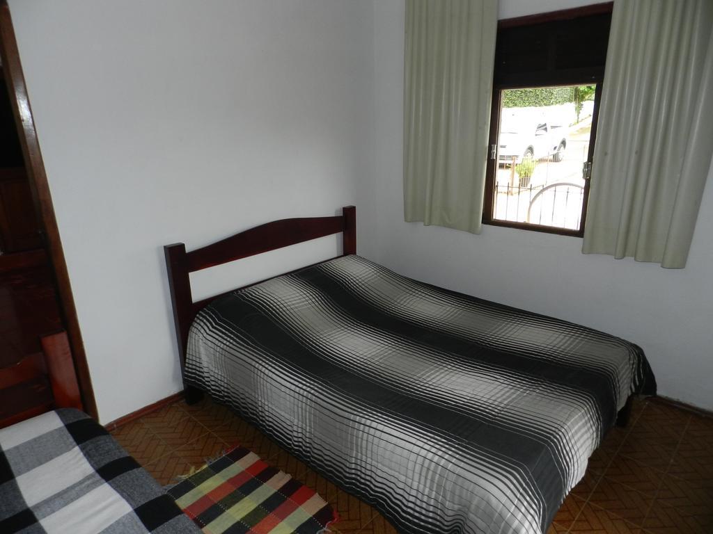 Pousada Hospedaria Santa Clara Santa Rita de Jacutinga Quarto foto